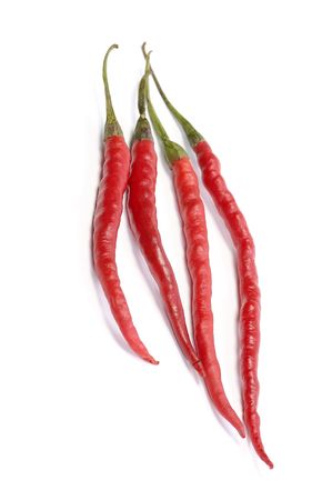 Four Red Hot Chili Peppers  on White Backgroundの写真素材