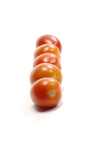 Five tomatoes on white background. Look tasty and freshの写真素材