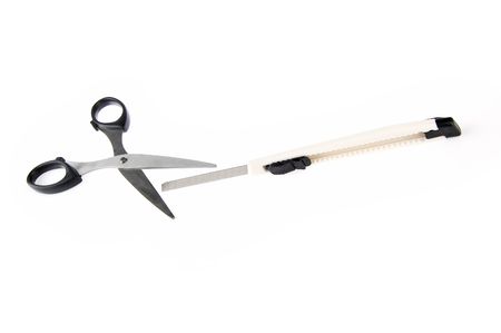 Scissors and paper cutter on white backgroundの写真素材