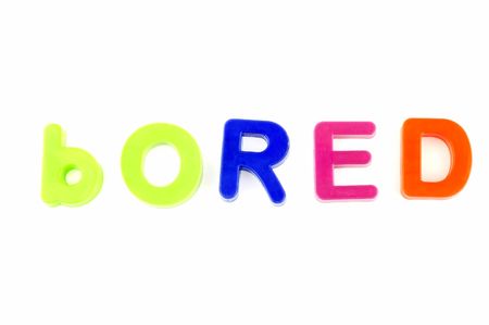 Word bored isolated on white background made from colorful toys lettersの写真素材