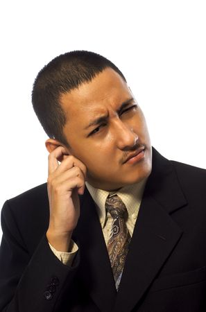 Businessman scratch his ear isolated on white backgroundの写真素材