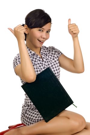 Female student feel success and thumb up gesture isolated on white backgroundの写真素材