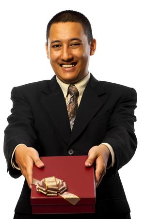 Business man giving a gift isolated on white backgroundの写真素材