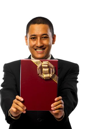 Business man giving a gift isolated on white backgroundの写真素材