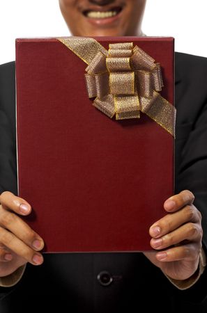 Business man giving a gift isolated on white backgroundの写真素材