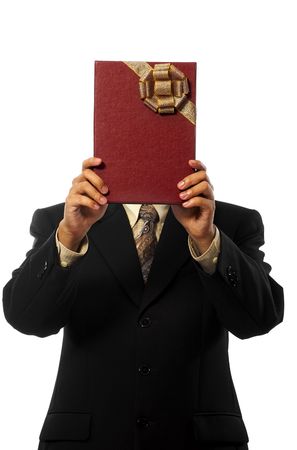 Business man giving a gift isolated on white backgroundの写真素材