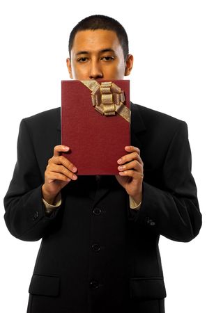 Business man giving a gift isolated on white backgroundの写真素材