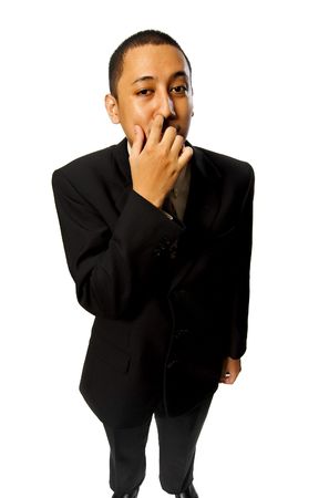 Business man pick his nose isolated on white backgroundの写真素材