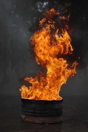 Barrel of oil on fire, this is very hotの写真素材
