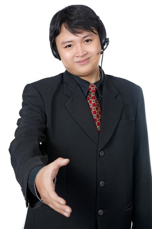 Asian phone operator wearing suit want to shake hand isolated over white backgroundの写真素材