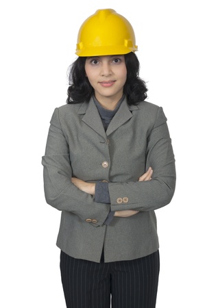 Architect woman in yellow hat isolated over white backgroundの写真素材