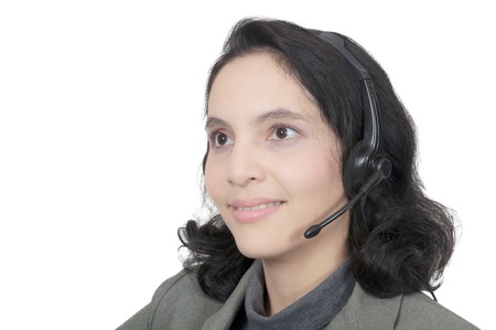Business woman with headset on a white backgroundの写真素材