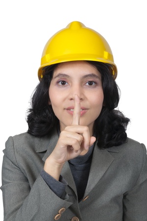 Mix race architect woman shut her mouth isolated over white backgroundの写真素材