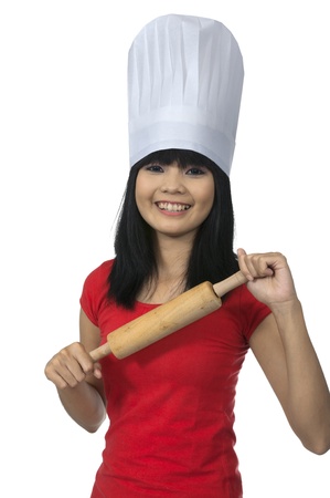 Asian chef woman smile isolated over white backgroundの写真素材