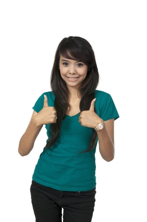 Asian woman in green shirt, give thumbs up isolated over white backgroundの写真素材