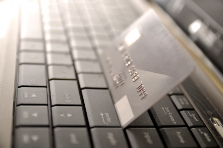 e-commerce concept. credit card and laptop with shallow DOFの写真素材