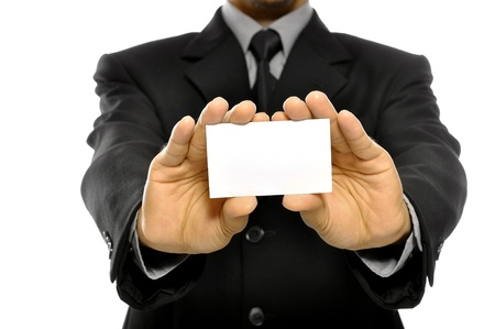 Business man holding name card isolated over white background. You can put your message on the cardの写真素材