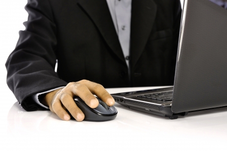 Man typing on laptop isolated over white backgroundの写真素材