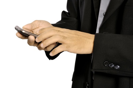 Close up of man using mobile smart phone isolated on white backgroundの写真素材