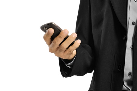 Close up of man using mobile smart phone isolated on white backgroundの写真素材