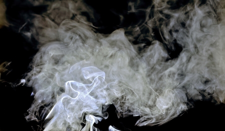 Abstract white smoke on black background  Good for your designの写真素材