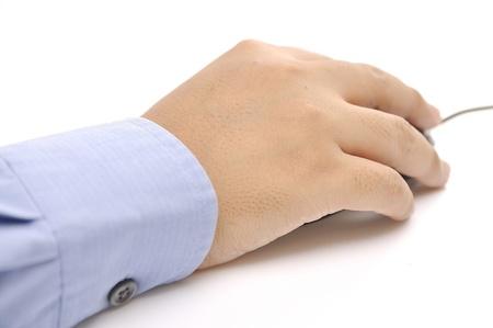 Male hand holding a mouse  This is working concept photoの写真素材