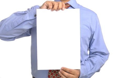 Businessman holding white paper. You can put your message on the paperの写真素材