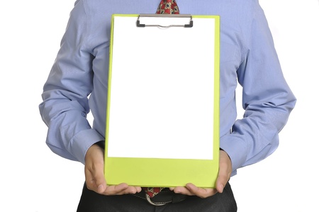 Businessman holding white paper on the clipboard. You can put your message on the paperの写真素材