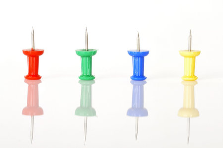 Thumbtack or pushpin set isolated over white background