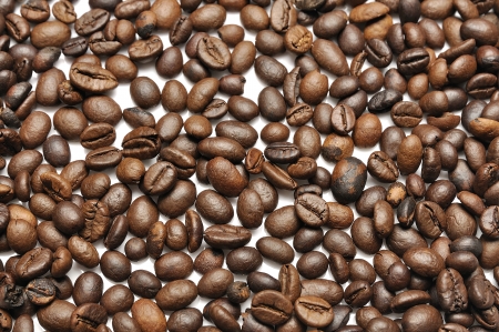 Coffee beans as a background isolated on whiteの写真素材