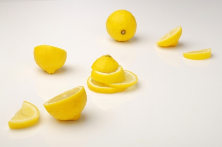 Juicy lemon fruit isolated over white backgroundの写真素材
