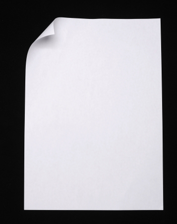 Sheet of paper folded onver black backgroundの写真素材