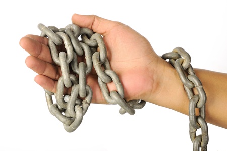 The hand with chain isolated over white backgroundの写真素材
