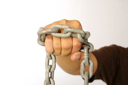 The hand with chain isolated over white backgroundの写真素材