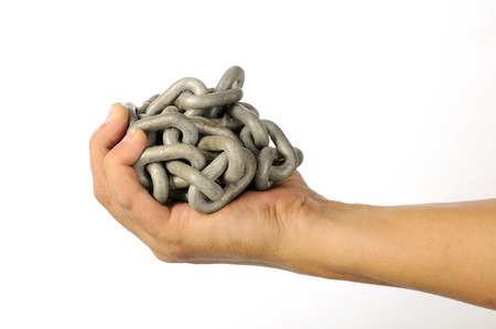 The hand with chain isolated over white backgroundの写真素材