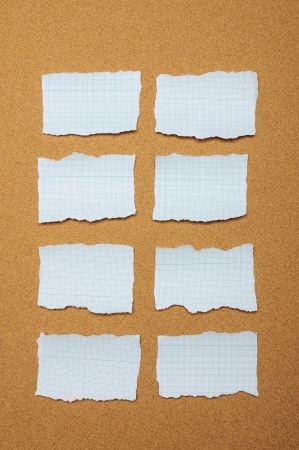 Set of blue torn piece of paper over brown backgroundの写真素材