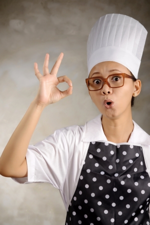 Funny woman chef say its ok  Good food conceptの写真素材