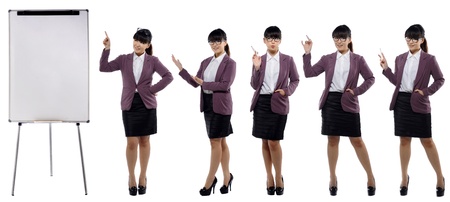 Set of images of young attractive business woman standing with a flipchart isolated over white background. You can choose your favorite gestureの写真素材