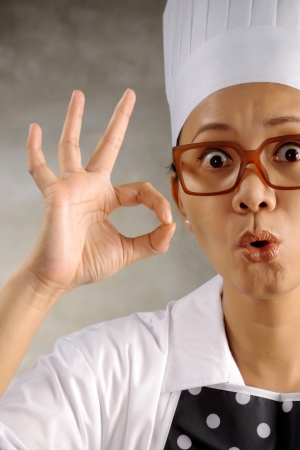Funny woman chef say its ok. Good food conceptの写真素材