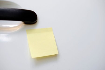 Blank yellow note on the car. You can put your message on the paper