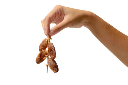 Female hands with date fruits over white background
