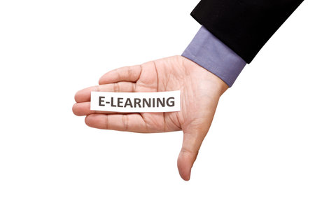 Hand holding paper with E-Learning text isolated over white 