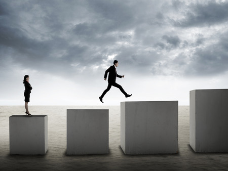 Business man jumping and woman wait. Competition conceptの写真素材