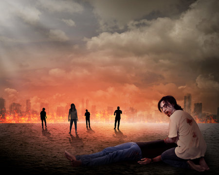 Creepy zombie eat dead man flesh with city on fire background