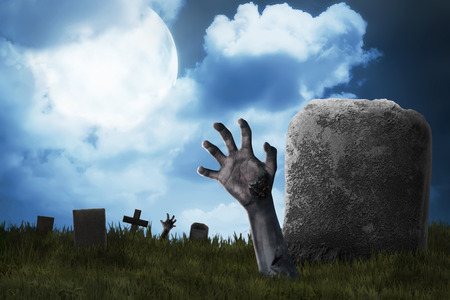 Zombie hand out from the graveyard. Halloween conceptの写真素材