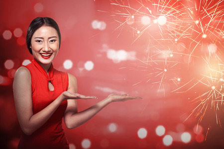 Asian woman in cheongsam dress. Happy chinese new year conceptの写真素材