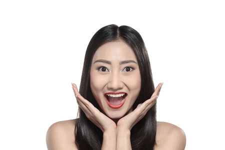 Beautiful asian woman isolated over white backgroundの写真素材
