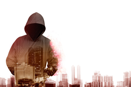 Man in hoodie shirt is hacker. Computer security conceptの写真素材