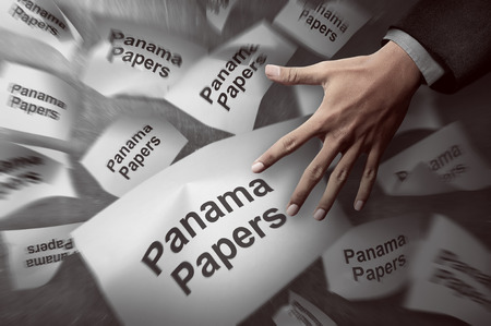 Image of man hand investigate panama papers scandalの写真素材