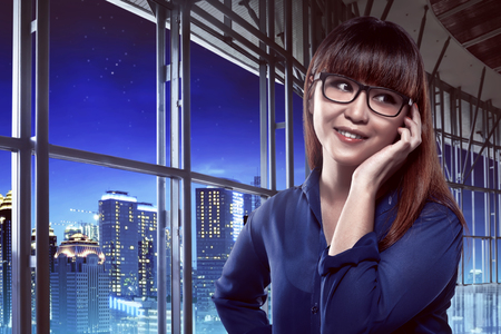 Asian business woman call by cellphoneの写真素材